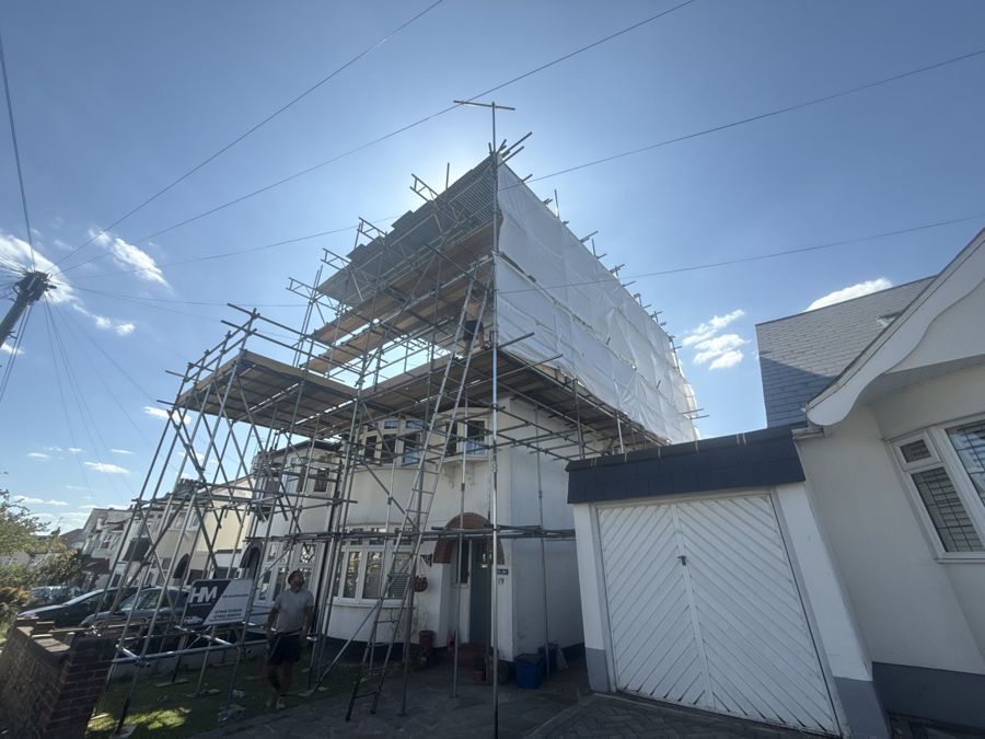 Scaffold on rendered building